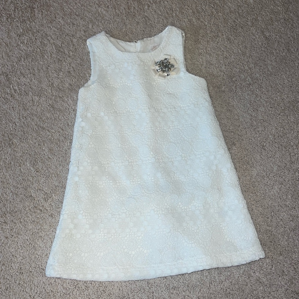 Adorable little girl cream dress
